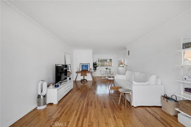 1330 N Crescent Heights Blvd Unit 12, West Hollywood, CA 90046 - living area featuring light wood finished floors and crown molding