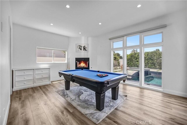 9743 Monogram Ave, Northridge, CA 91343 - rec room with wood finished floors, recessed lighting, billiards, baseboards, and a glass covered fireplace