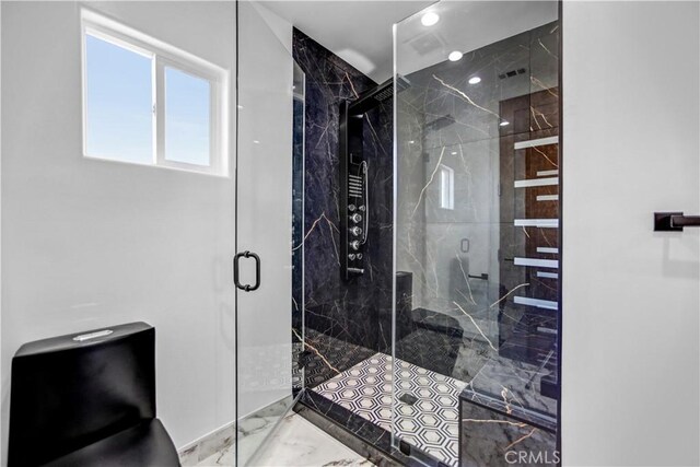 9743 Monogram Ave, Northridge, CA 91343 - bathroom with marble tiled flooring, a marble finish shower, and toilet