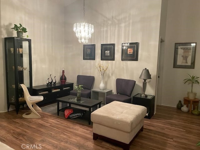 1041 Cypress Point Dr, Banning, CA 92220 - living area with wood finished floors, a chandelier, and baseboards