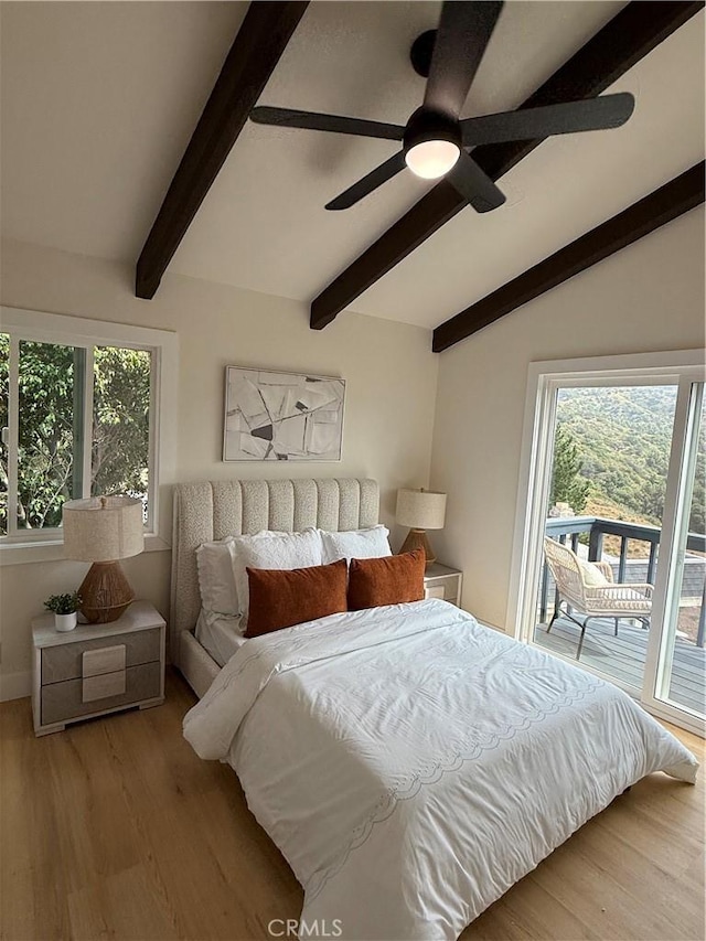 2838 Lambert Dr, Los Angeles, CA 90068 - bedroom with multiple windows, wood finished floors, and a ceiling fan
