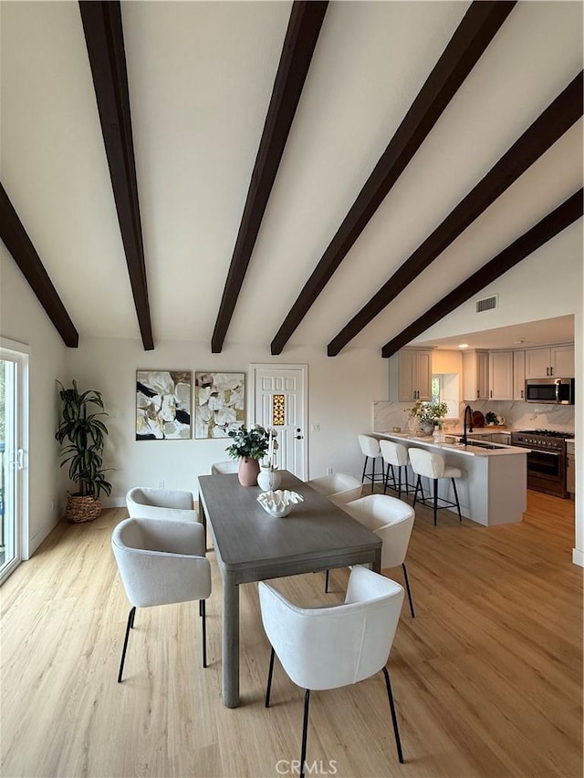 2838 Lambert Dr, Los Angeles, CA 90068 - dining room with light wood-type flooring