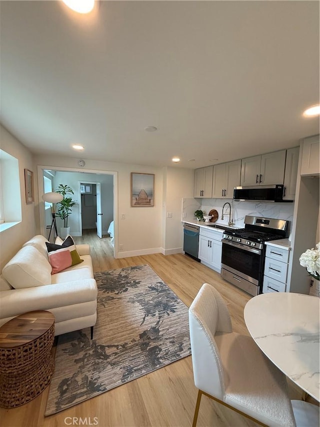 2838 Lambert Dr, Los Angeles, CA 90068 - living area with baseboards, light wood-type flooring, and recessed lighting