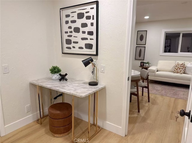 2838 Lambert Dr, Los Angeles, CA 90068 - detailed view of wood finished floors, baseboards, and a textured wall
