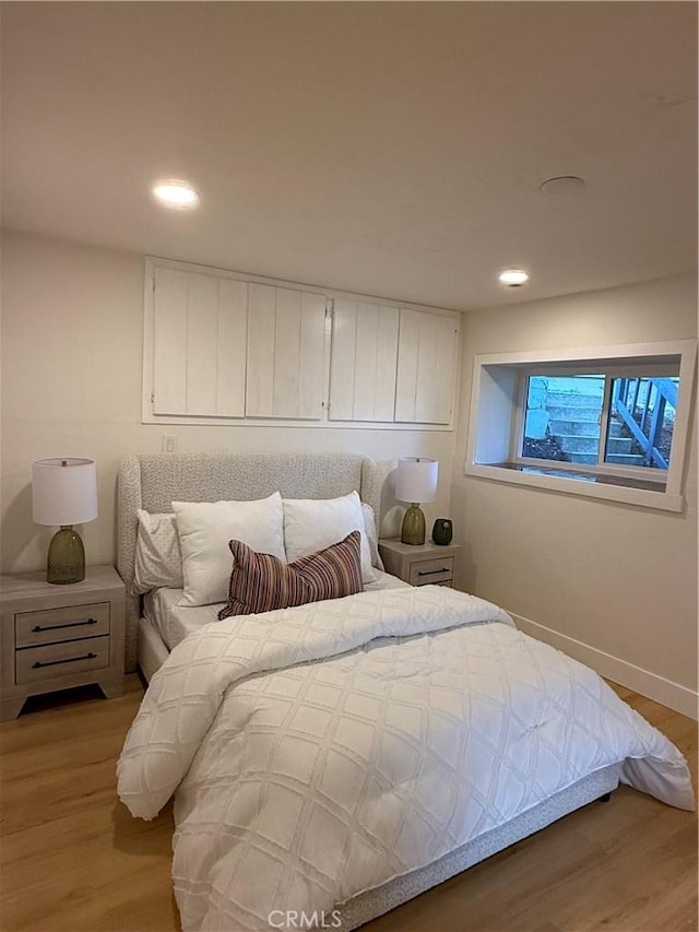 2838 Lambert Dr, Los Angeles, CA 90068 - bedroom with light wood-style flooring, recessed lighting, and baseboards