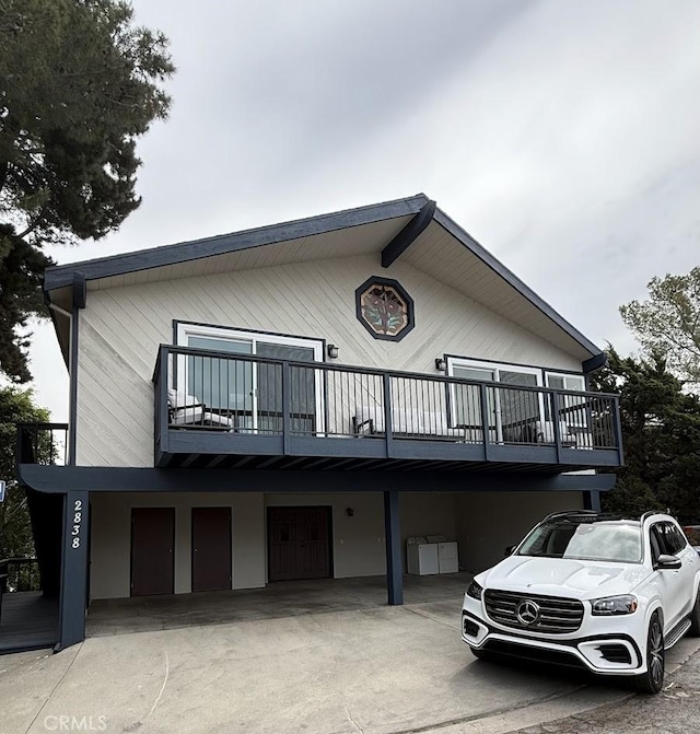 2838 Lambert Dr, Los Angeles, CA 90068 - view of front of home with a balcony and driveway