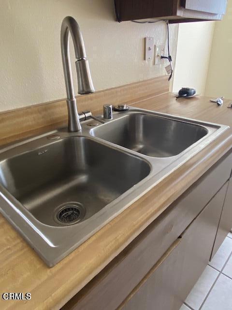 330 S Mentor Ave Unit 233, Pasadena, CA 91106 - kitchen view of a sink and light countertops