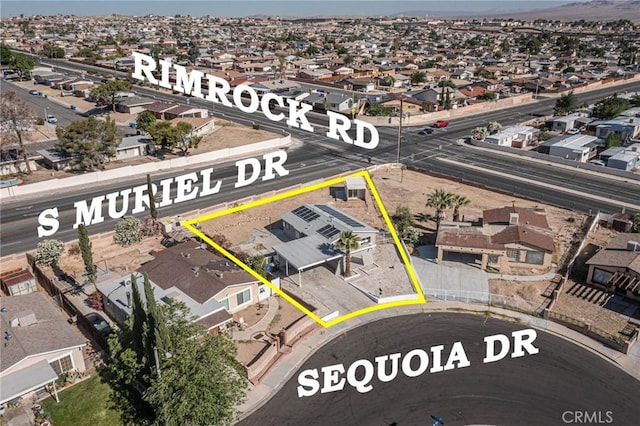 2008 Sequoia Dr, Barstow, CA 92311 - aerial view of residential area with property parcel outlined and a mountainous background
