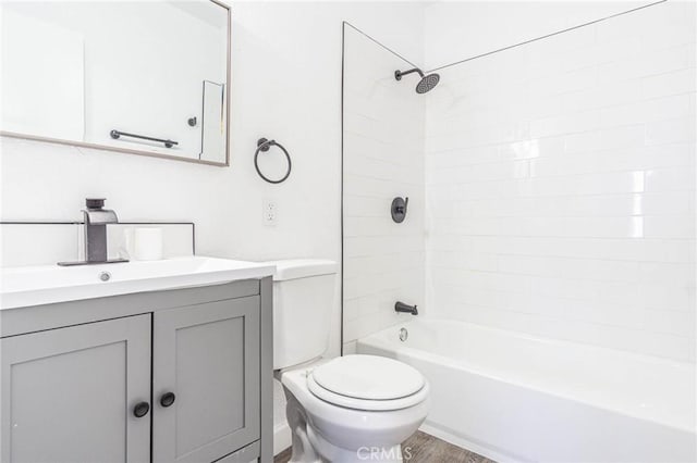 2008 Sequoia Dr, Barstow, CA 92311 - full bath featuring toilet, vanity, shower / washtub combination, and wood finished floors