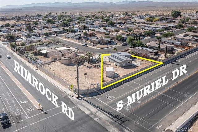2008 Sequoia Dr, Barstow, CA 92311 - aerial perspective of suburban area featuring mountains and property boundaries highlighted