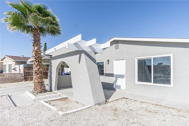 2008 Sequoia Dr, Barstow, CA 92311 - view of front of home with stucco siding and a patio area