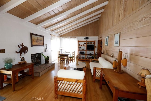6441 Varna Ave, Valley Glen, CA 91401 - living room featuring wooden ceiling, light wood finished floors, and wood walls