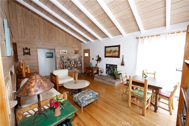 6441 Varna Ave, Valley Glen, CA 91401 - living room with a tile fireplace, wooden ceiling, wood finished floors, and wood walls