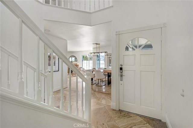 245 Palmer St, Costa Mesa, CA 92627 - entryway featuring stairs and a chandelier