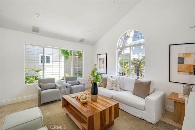 245 Palmer St, Costa Mesa, CA 92627 - living area with plenty of natural light, baseboards, and high vaulted ceiling