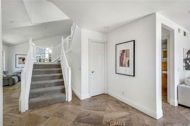 245 Palmer St, Costa Mesa, CA 92627 - stairway featuring baseboards and vaulted ceiling