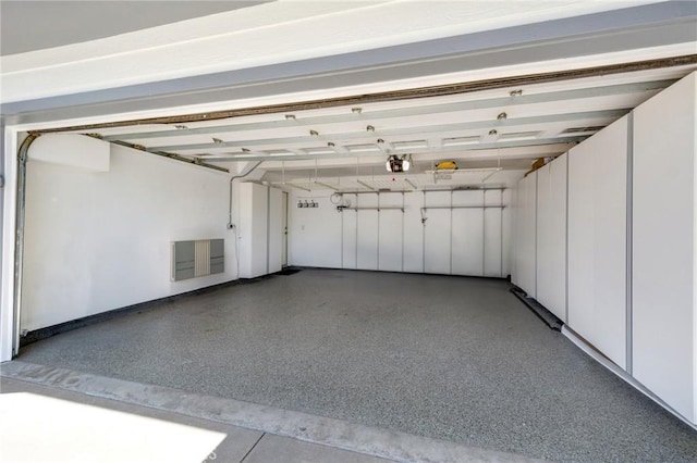 245 Palmer St, Costa Mesa, CA 92627 - garage with a garage door opener and baseboards