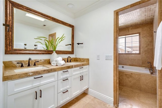 245 Palmer St, Costa Mesa, CA 92627 - bathroom with double vanity, tiled bath, ornamental molding, baseboards, and tile patterned floors
