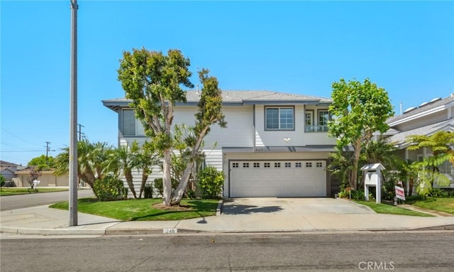245 Palmer St, Costa Mesa, CA 92627 - view of front of house with a garage and driveway