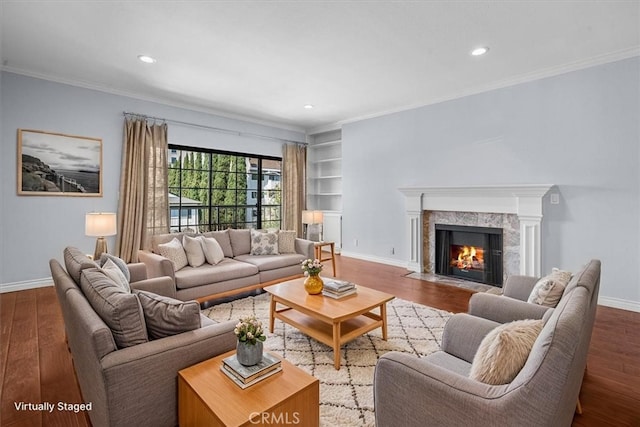 3568 Keystone Ave Unit 8, Los Angeles, CA 90034 - living room featuring baseboards, wood finished floors, ornamental molding, recessed lighting, and built in features