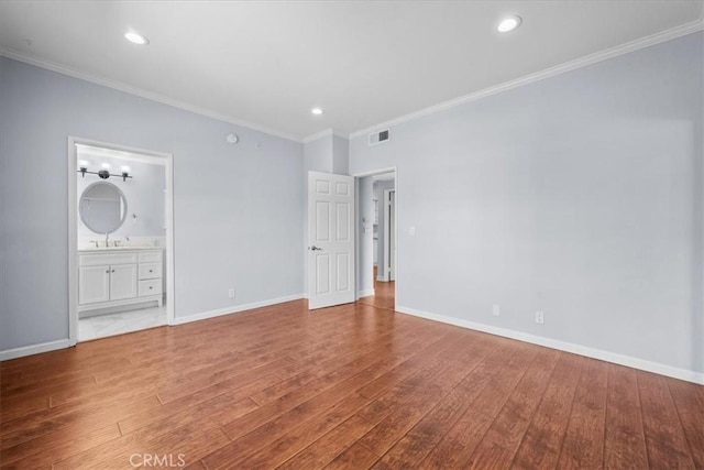 3568 Keystone Ave Unit 8, Los Angeles, CA 90034 - unfurnished bedroom with hardwood / wood-style floors, baseboards, crown molding, recessed lighting, and ensuite bathroom