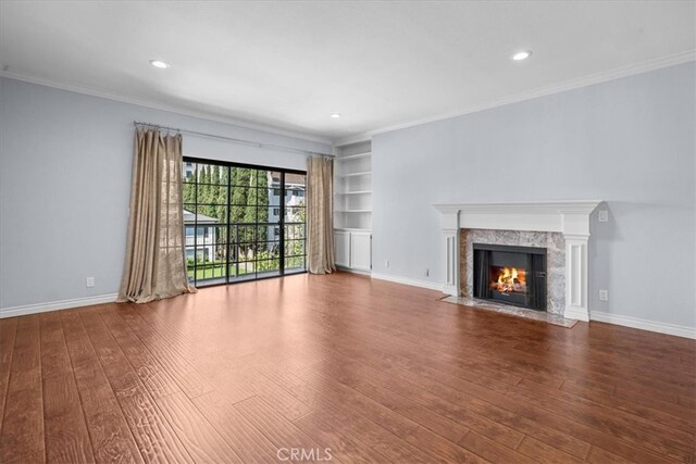 3568 Keystone Ave Unit 8, Los Angeles, CA 90034 - unfurnished living room with wood finished floors, a fireplace, crown molding, recessed lighting, and baseboards
