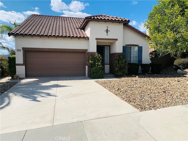35419 El Diamante Dr, Wildomar, CA 92595 - mediterranean / spanish-style house with stucco siding, a garage, and a tiled roof