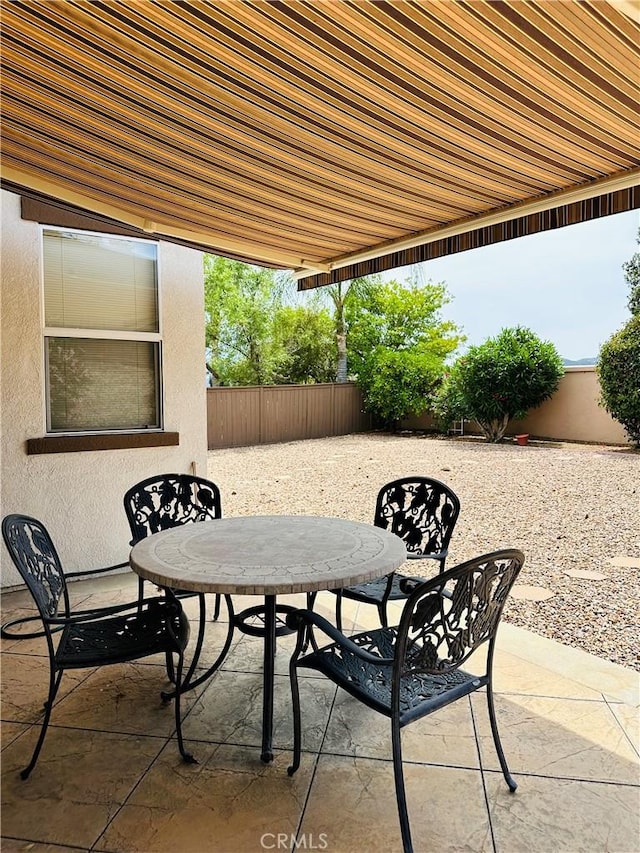 35419 El Diamante Dr, Wildomar, CA 92595 - fenced backyard with a patio area and outdoor dining area
