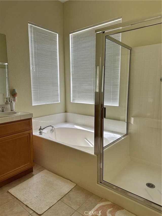 35419 El Diamante Dr, Wildomar, CA 92595 - full bath with tile patterned floors, vanity, a garden tub, and a shower stall