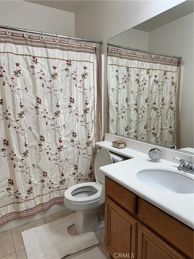 35419 El Diamante Dr, Wildomar, CA 92595 - full bathroom with toilet, vanity, tile patterned floors, and shower / bath combo with shower curtain