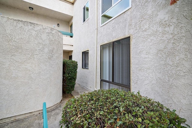 2308 Altisma Way Unit 123, Carlsbad, CA 92009 - view of property exterior with stucco siding