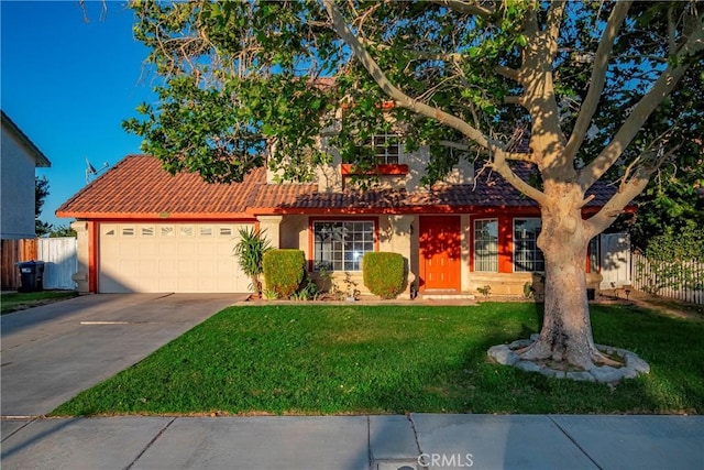 37538 Stonegate Ln, Palmdale, CA 93552 - view of front of home featuring a garage, a tiled roof, concrete driveway, and stucco siding
