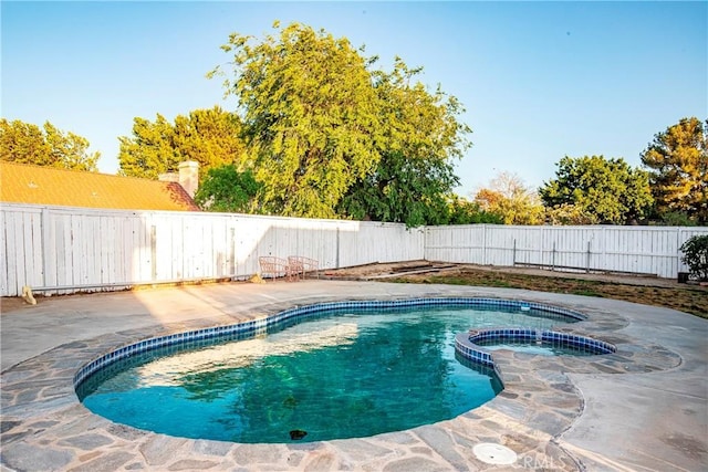 37538 Stonegate Ln, Palmdale, CA 93552 - view of swimming pool with a fenced backyard, a pool with connected hot tub, and a patio area