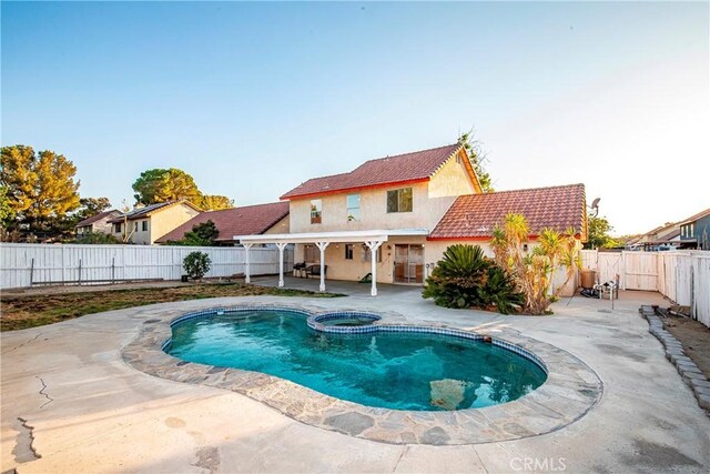 37538 Stonegate Ln, Palmdale, CA 93552 - view of pool featuring a patio, a fenced backyard, and a pool with connected hot tub