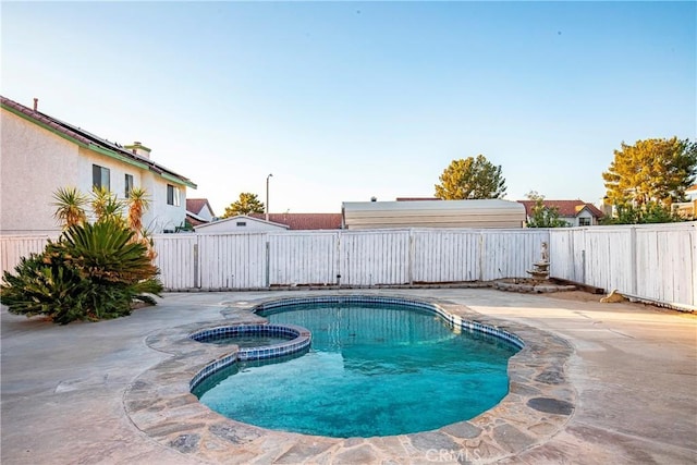 37538 Stonegate Ln, Palmdale, CA 93552 - view of swimming pool with a fenced backyard, a pool with connected hot tub, and a patio area