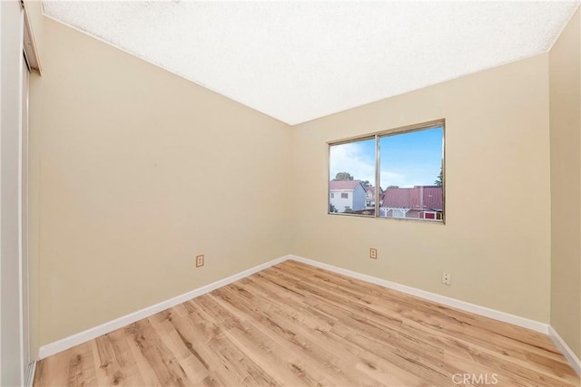 37538 Stonegate Ln, Palmdale, CA 93552 - spare room featuring baseboards and light wood-style floors