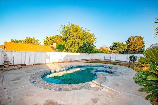 37538 Stonegate Ln, Palmdale, CA 93552 - view of pool featuring a fenced backyard, a patio, and a pool with connected hot tub
