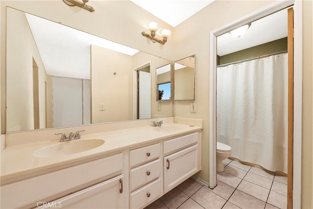 37538 Stonegate Ln, Palmdale, CA 93552 - full bath featuring toilet, double vanity, tile patterned flooring, and a shower with shower curtain