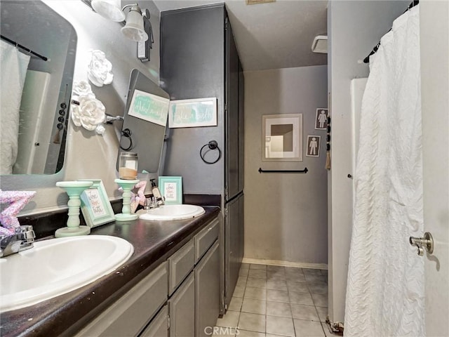 20715 Teton Rd, Apple Valley, CA 92308 - full bathroom featuring tile patterned flooring, double vanity, and a shower with curtain