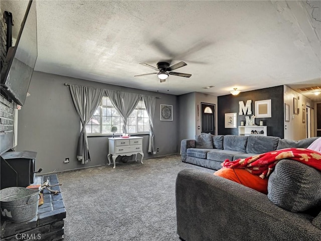 20715 Teton Rd, Apple Valley, CA 92308 - living room with a ceiling fan, a textured ceiling, and carpet flooring