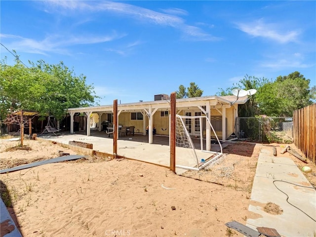 20715 Teton Rd, Apple Valley, CA 92308 - rear view of property with a patio area and a fenced backyard