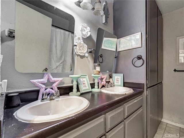 20715 Teton Rd, Apple Valley, CA 92308 - bathroom featuring tile patterned floors and double vanity