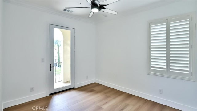 53 Via Armilla, San Clemente, CA 92673 - spare room with wood finished floors, ornamental molding, plenty of natural light, and a ceiling fan