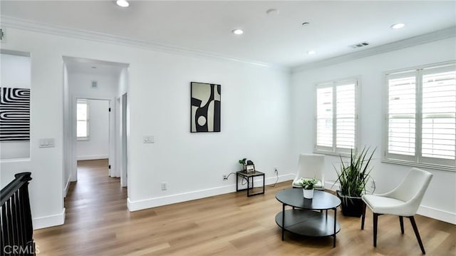 53 Via Armilla, San Clemente, CA 92673 - sitting room featuring plenty of natural light, crown molding, light wood-style flooring, recessed lighting, and baseboards