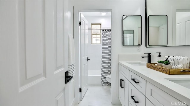 53 Via Armilla, San Clemente, CA 92673 - bathroom with double vanity, shower / tub combo, and marble look tiles