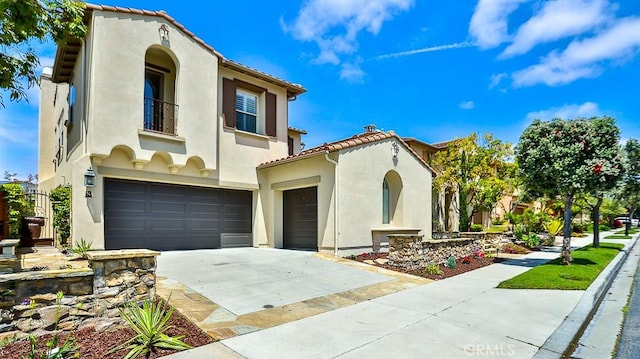 53 Via Armilla, San Clemente, CA 92673 - mediterranean / spanish-style home featuring stucco siding, concrete driveway, a tile roof, and a balcony