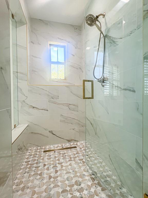 53 Via Armilla, San Clemente, CA 92673 - full bathroom featuring a marble finish shower