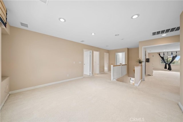 7343 Legacy Pl, Rancho Cucamonga, CA 91730 - unfurnished living room featuring light carpet, baseboards, and recessed lighting