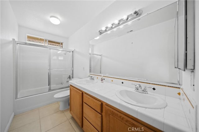 7343 Legacy Pl, Rancho Cucamonga, CA 91730 - full bath with toilet, double vanity, enclosed tub / shower combo, and tile patterned floors