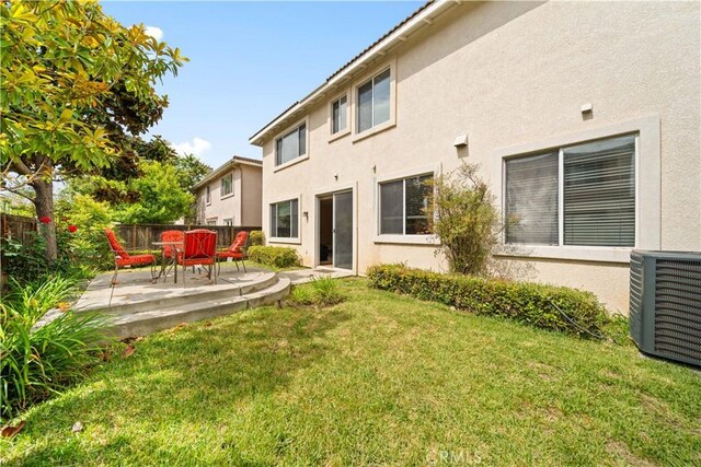 7343 Legacy Pl, Rancho Cucamonga, CA 91730 - rear view of house featuring cooling unit, stucco siding, and a patio area